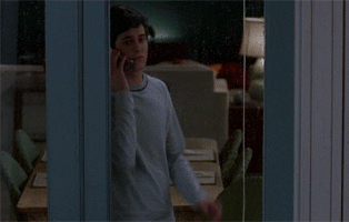 Seth from the O.C. longingly puts his hand on a window