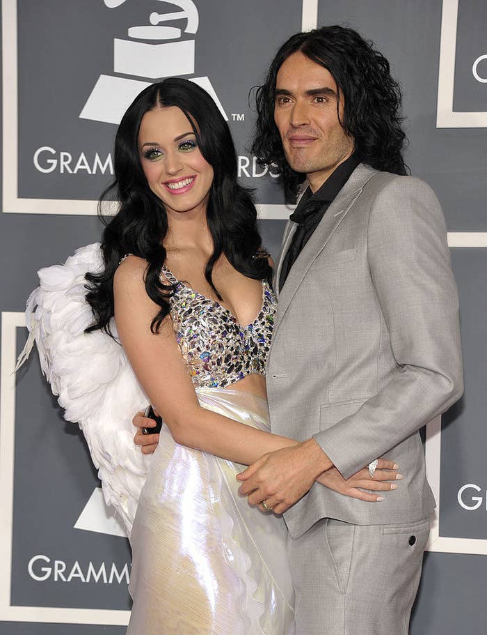 Katy and Russell embracing on the red carpet