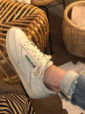 reviewer wearing chalk colored reebok vintage sneaker