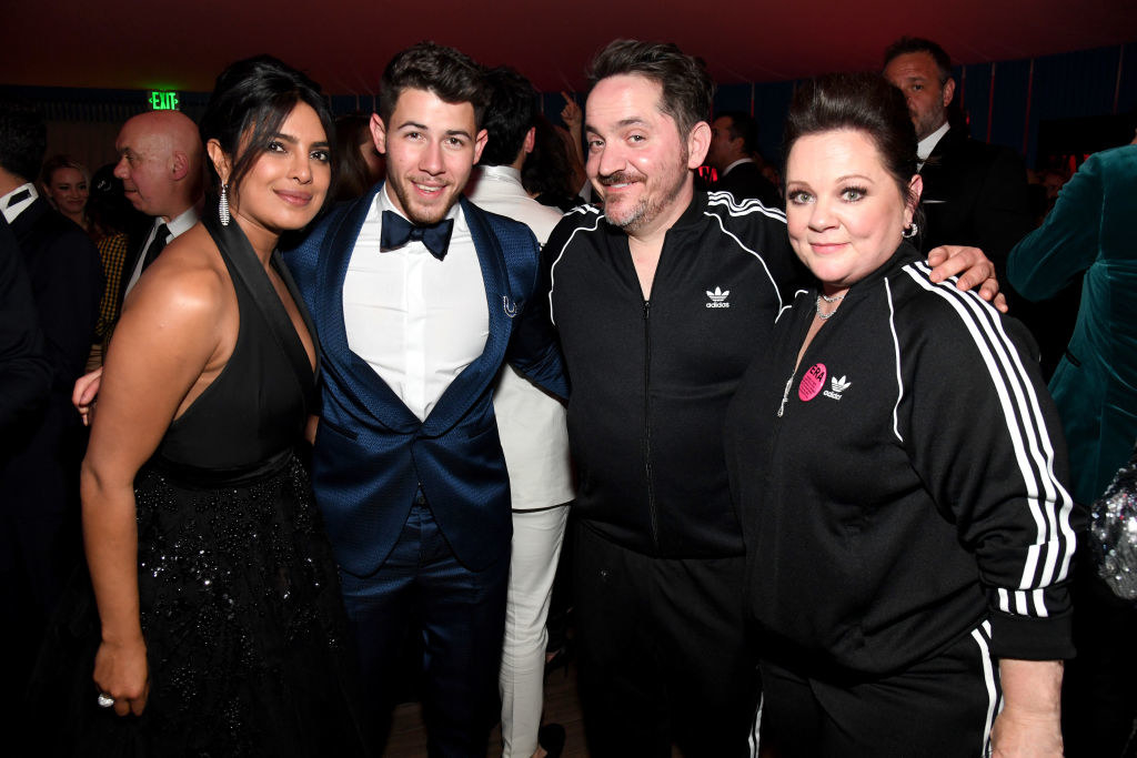 Priyanka Chopra, Nick Jonas, Ben Falcone, and Melissa McCarthy pose for a group photo at the 2019 Vanity Fair Oscar Party