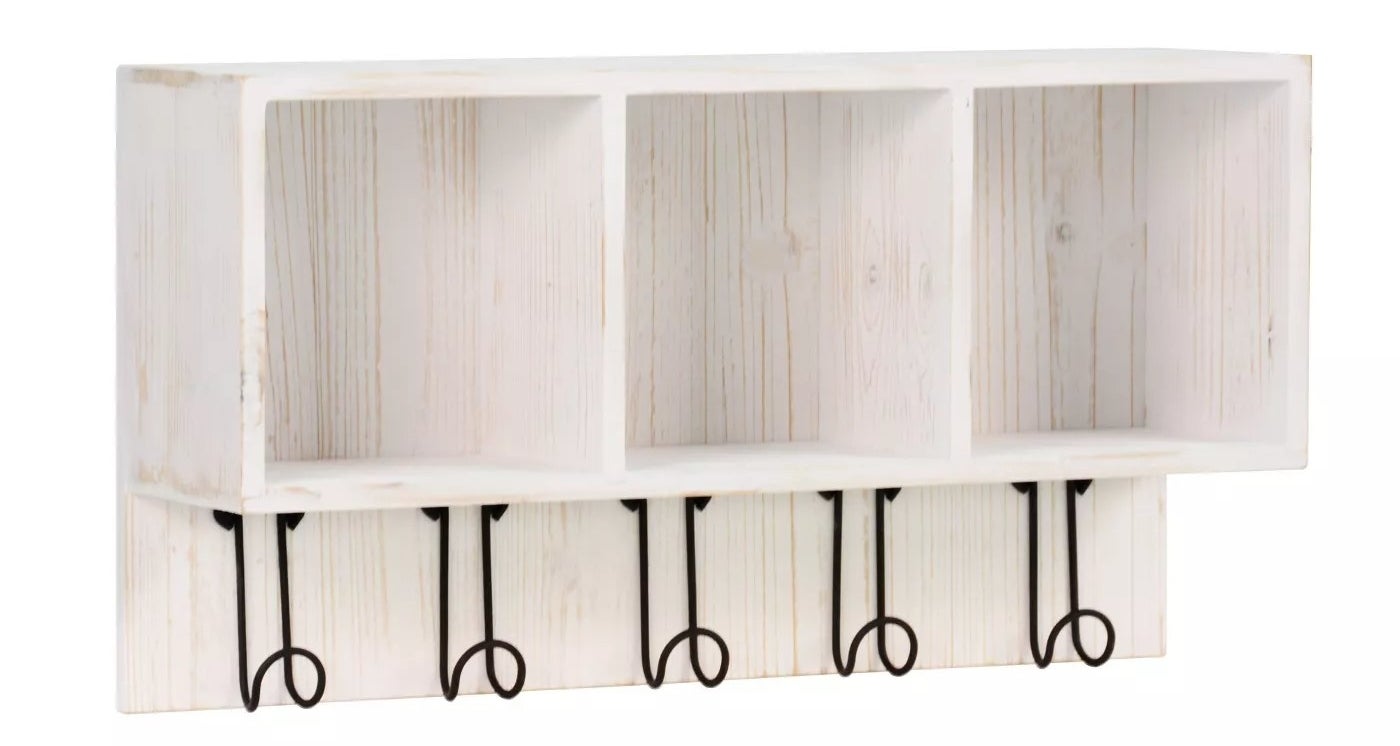 A 3 cubby box with hangers