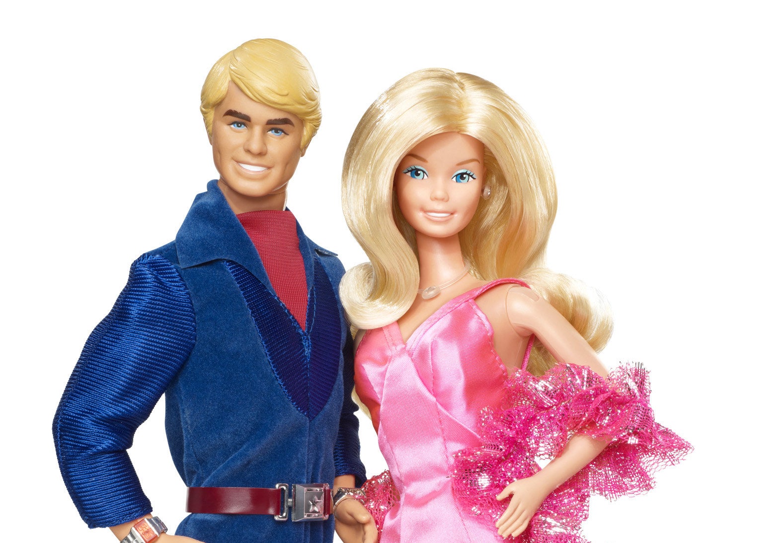 Ken in a blue velvet jumpsuit and Barbie in a pink dress with hot pink boa