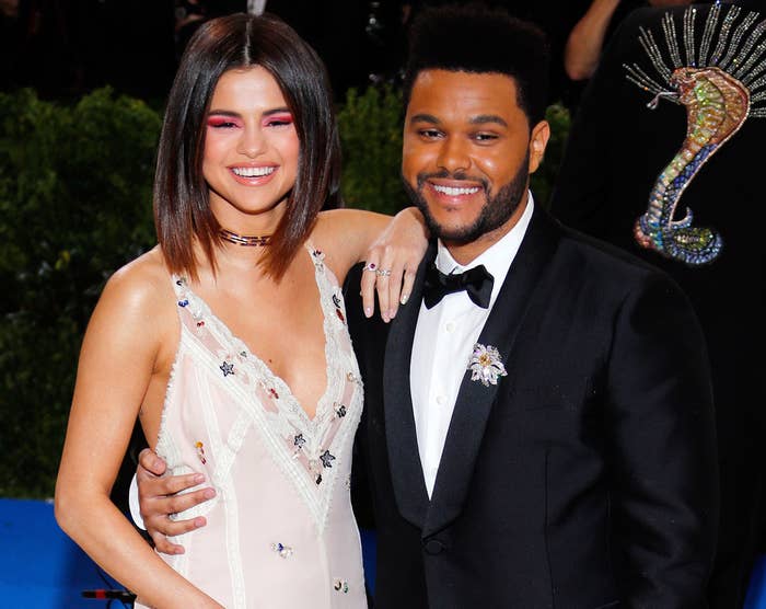 Selena poses with The Weeknd 