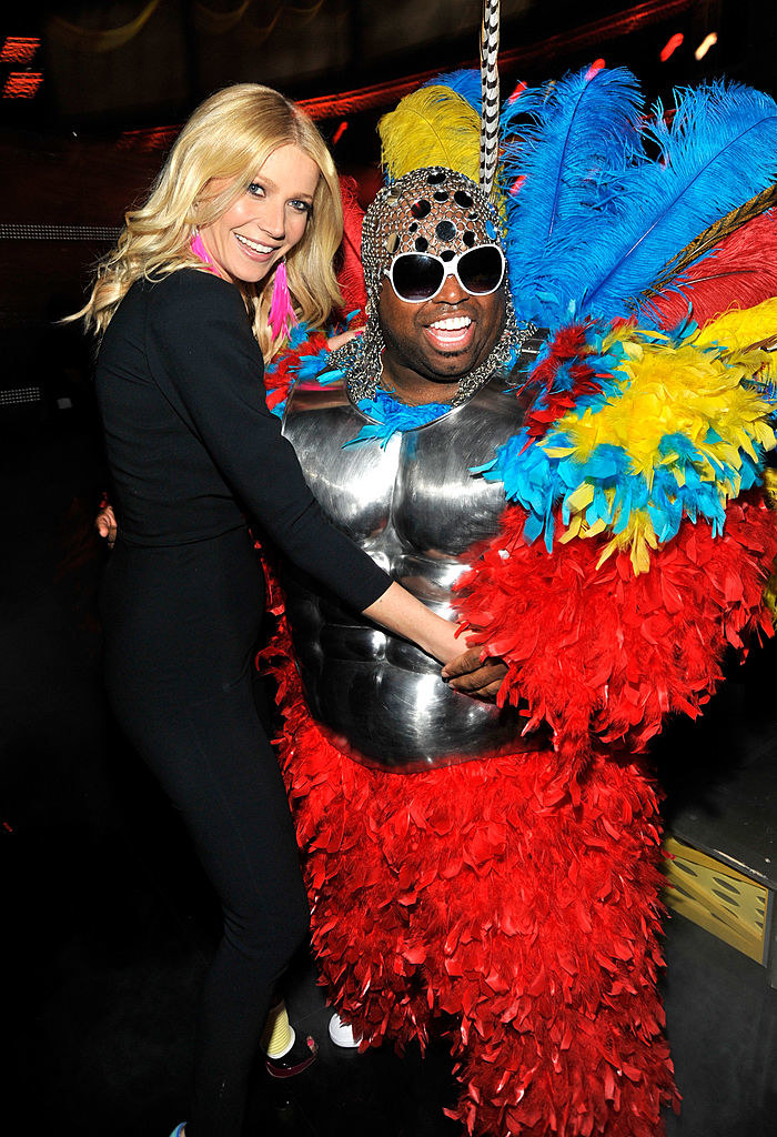 Cee Lo Green wearing a feathered costume with a breast plate