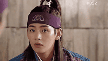 V looks disappointed and then smiles in Hwarang