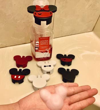 Different designs for the dispenser including Mickey, Baymax, and Star Wars 