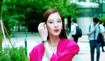 Seohyun flicks her hair off her shoulder in Private Lives