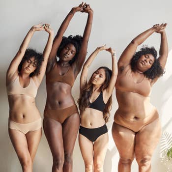 Four models of different races and sizes wearing different-colored bra and underwear sets
