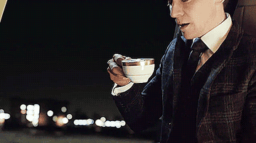 GIF of British actor Tom Hiddleston sipping tea from a teacup