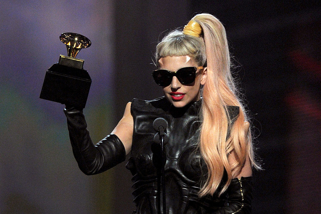 Lady Gaga accepting her award onstage