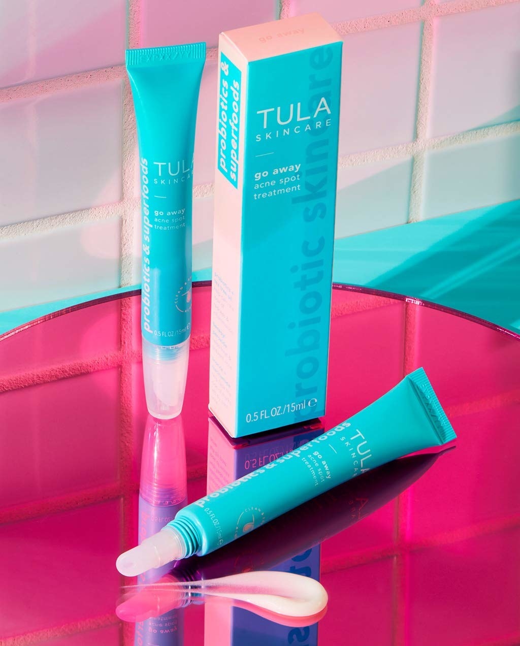 Bottles of Tula Skincare Go Away Acne Spot Treatment