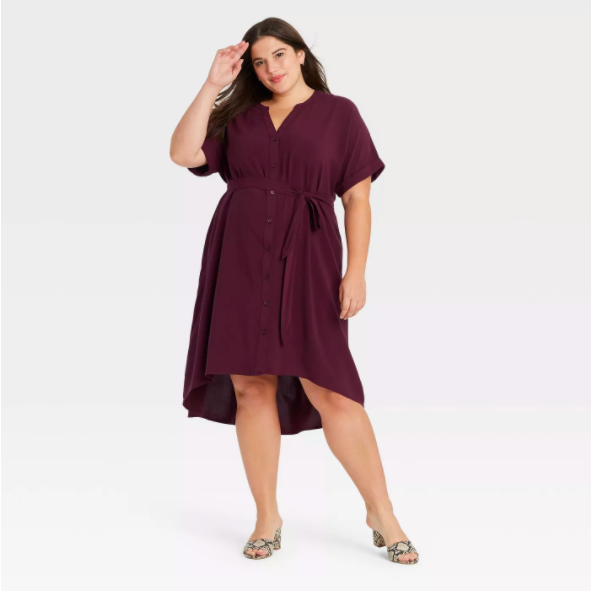 a model wearing the dress in burgundy color 