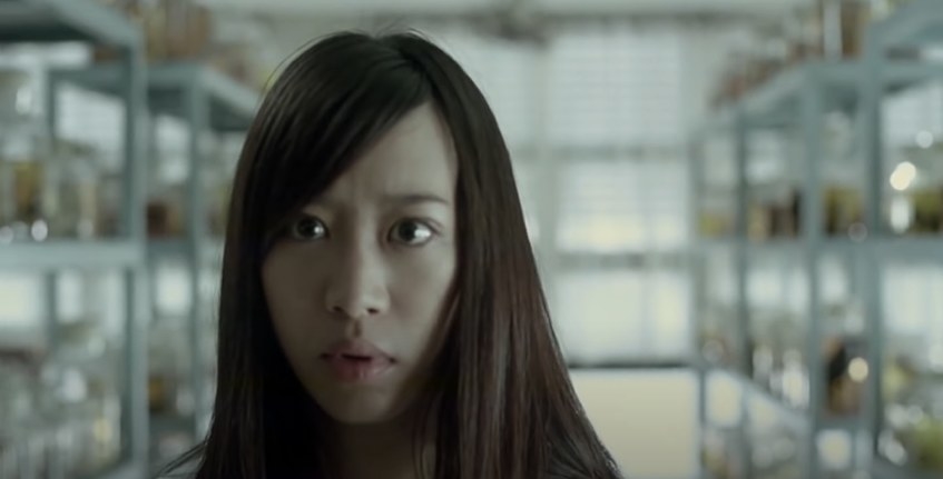Young woman looking frightened.