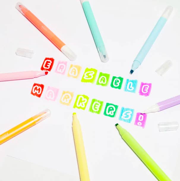 Several markers surrounding the words, &quot;erasable markers!&quot;