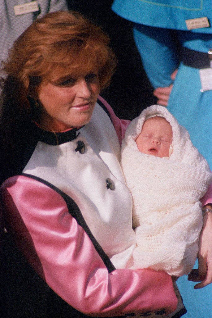 Sarah, Duchess of York leaves the Portland Hospital in London with her new daughter, Princess Eugenie, 30th March 1990