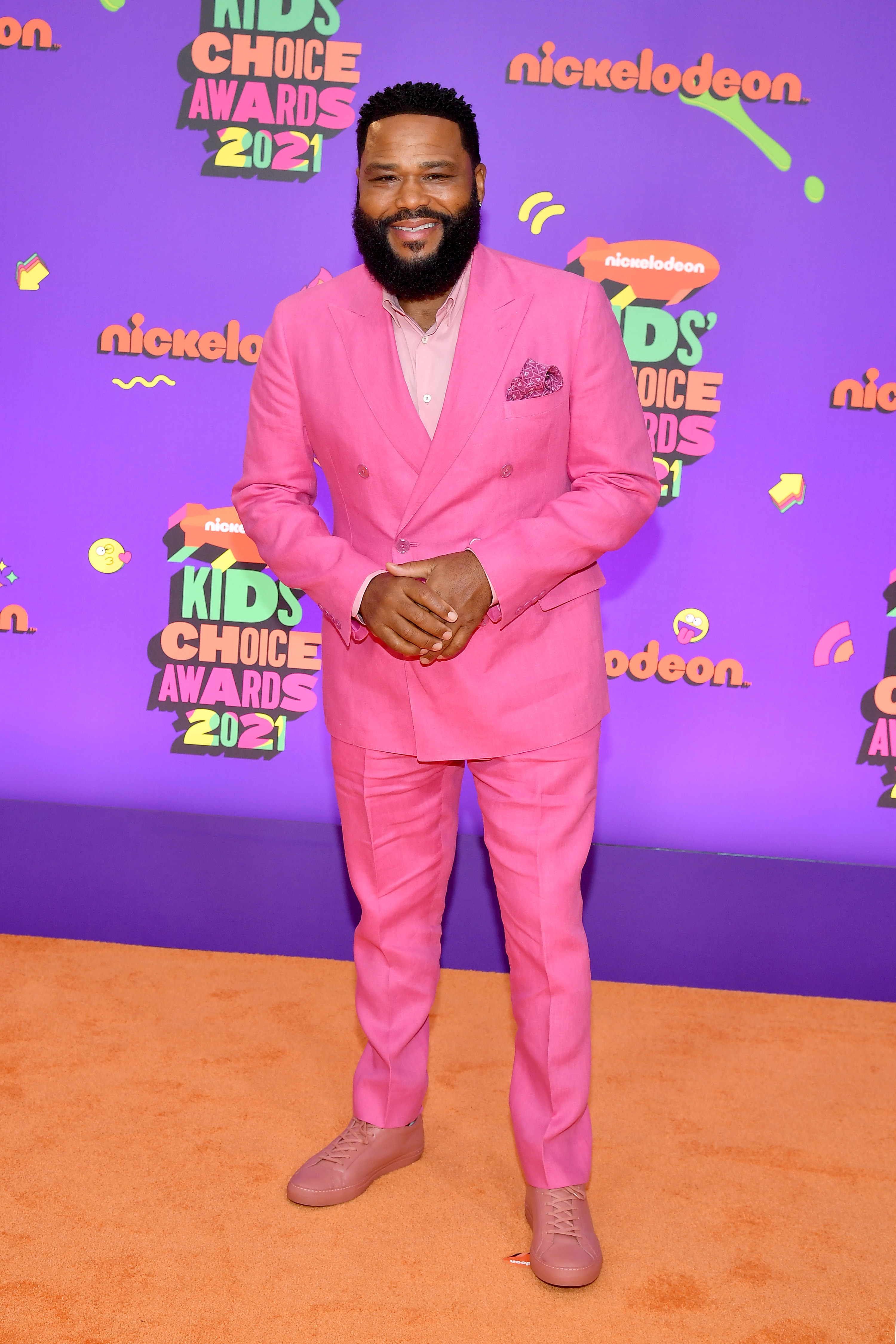 Anthony in a pink suit paired with a pink button down and pink shoes