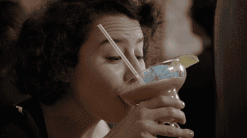 Abbi and Ilana drinking frozen cocktails in "Broad City."