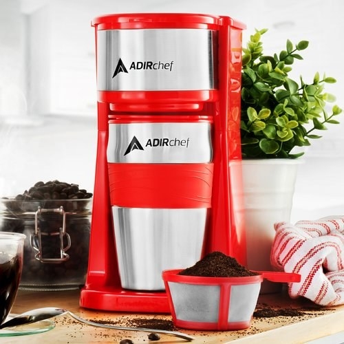 a red personal coffee maker