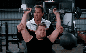 Gif of James Corden exhausted while working out 