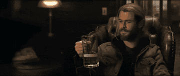 Chris Evans drinking a beer in "The Avengers."