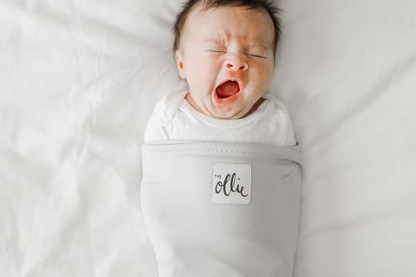 A baby in the swaddle.