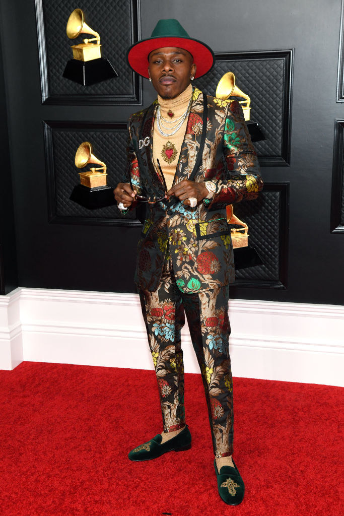 DaBaby in a floral-print suit and matching fedora and smoking shoes