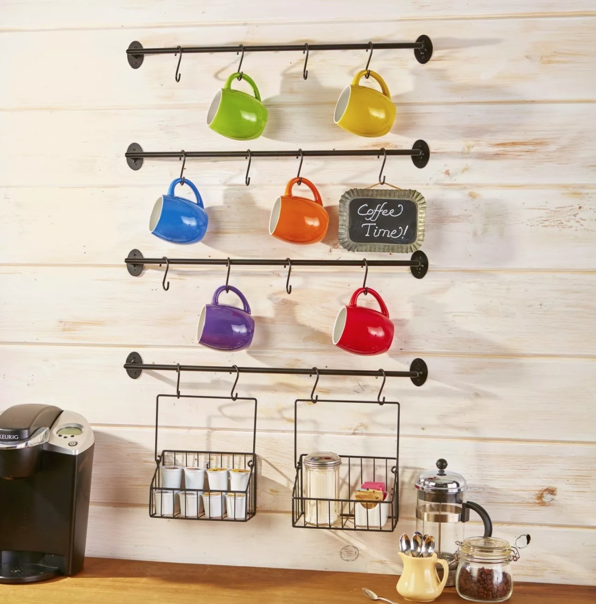 Four wall-mounted bars with hooks for mugs