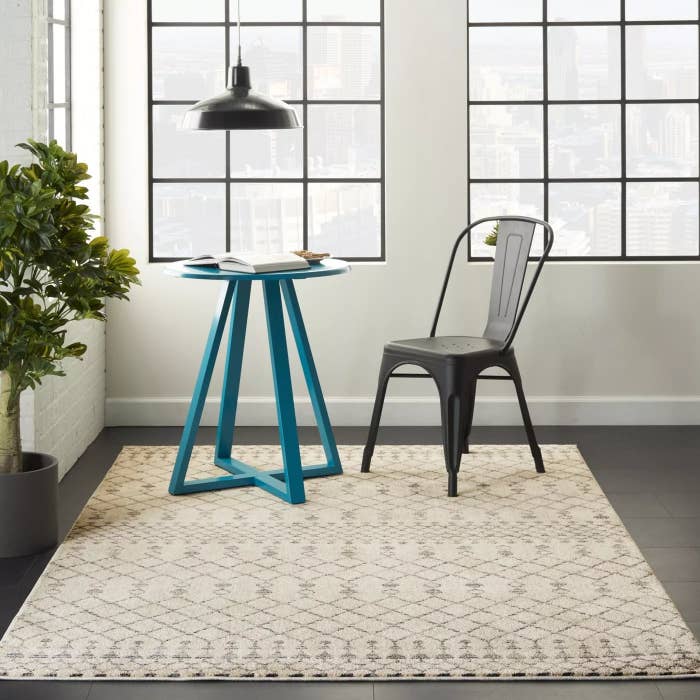 The beige and gray area rug