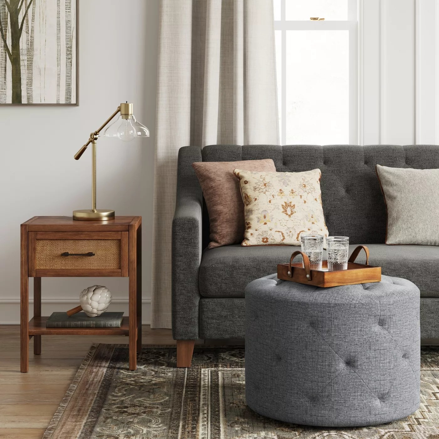 The tufted ottoman in charcoal