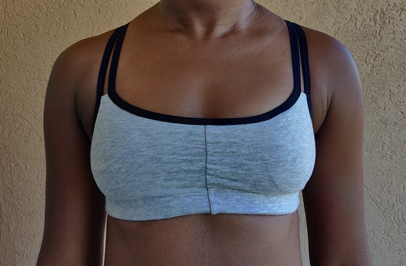 Reviewer in the sports bra with double cami-like straps 