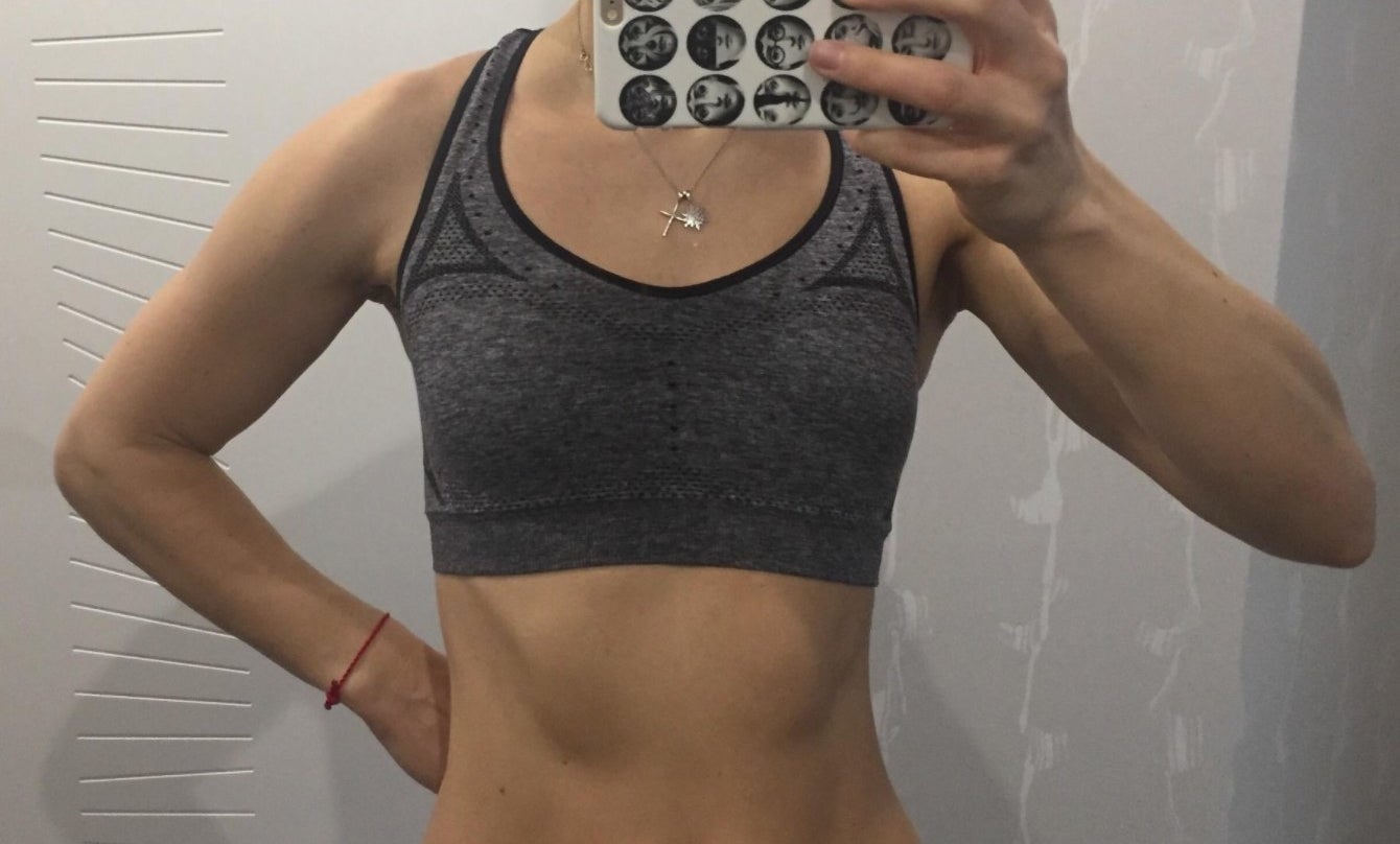 Reviewer in the wide-strap sports bra in gray 