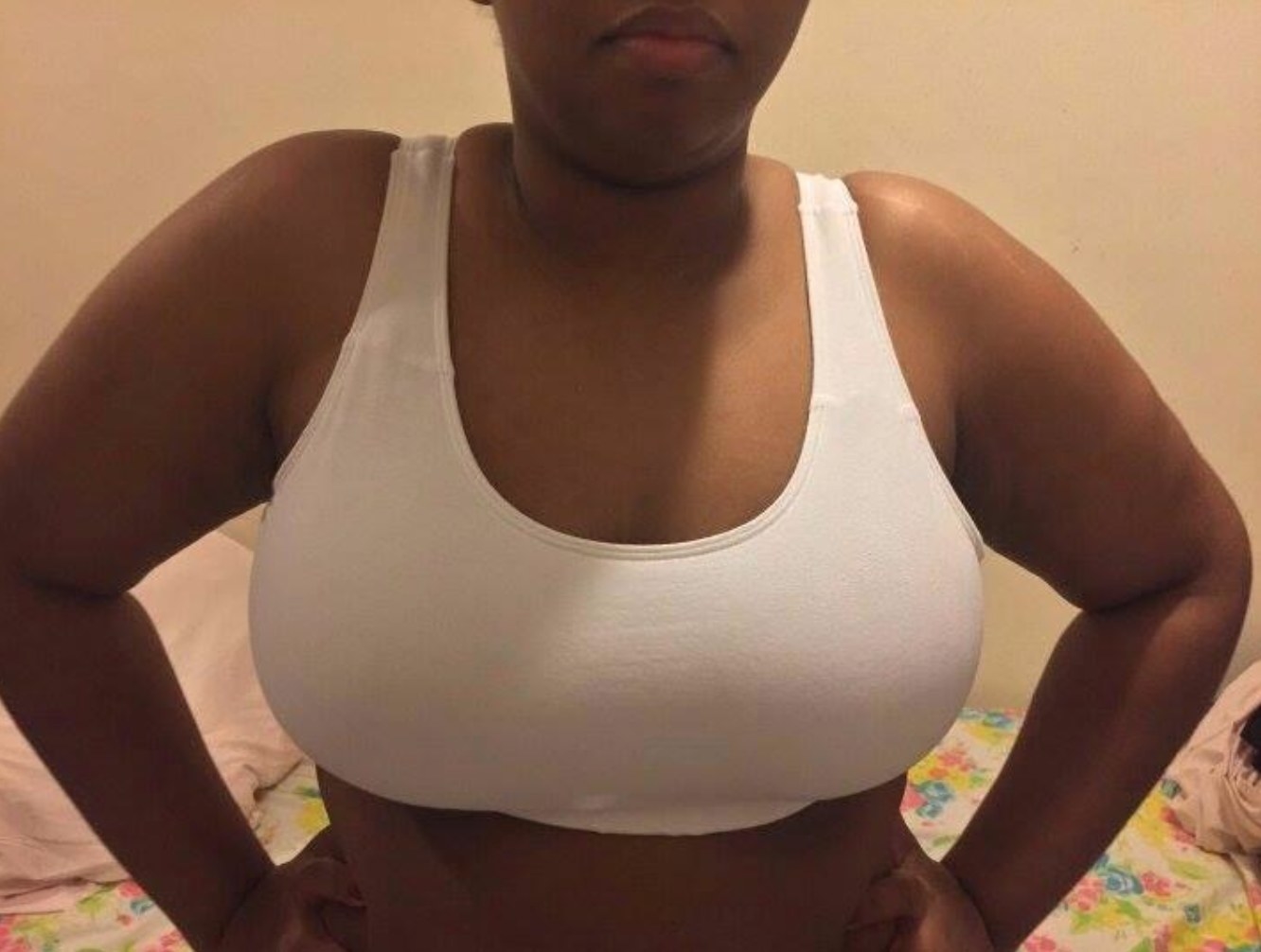 Reviewer wearing the cotton sports bra in white
