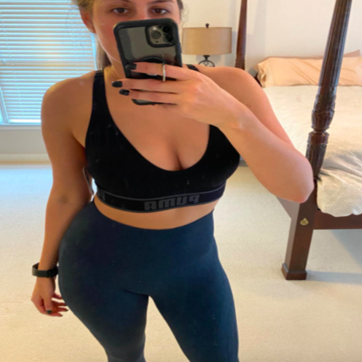 Front of the reviewer's V-neck sports bra