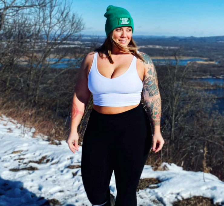 Reviewer in the tank-like sports bra that fits like a crop top 