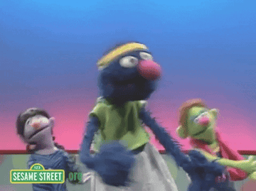 Gif of Sesame Street characters exercising and dancing 