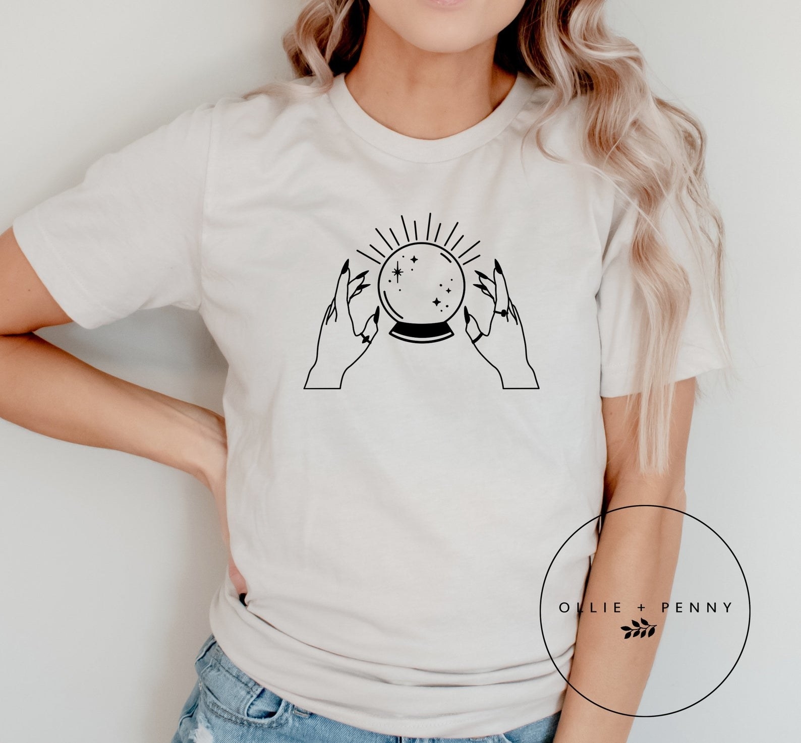 model wearing t-shirt that has a crystal ball on it 
