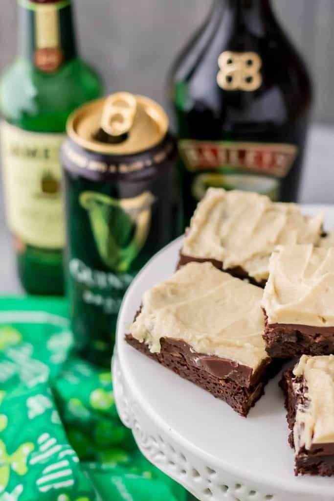 Irish car bomb brownies with liquor bottles in the background.