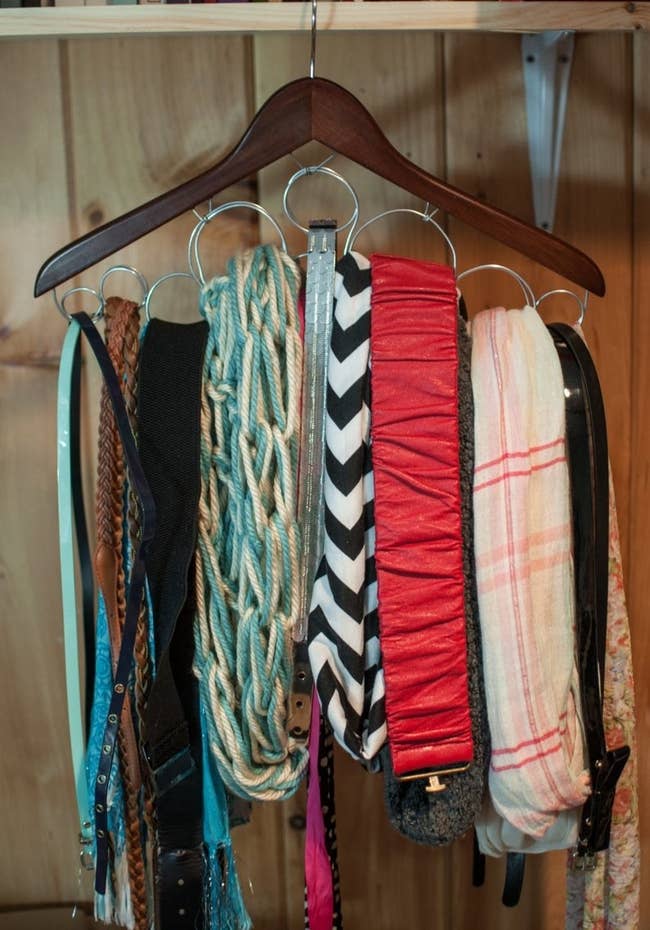 Scarf hanger with various scarves placed inside