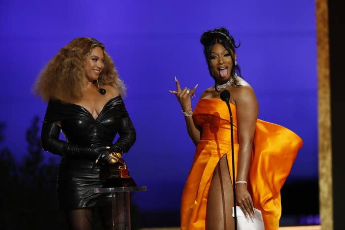 Megan Thee Stallion and Beyoncé accepting the award for Best Rap Song