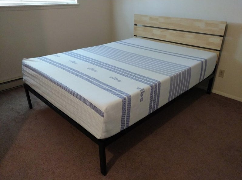 A Queen-sized mattress in a reviewer&#x27;s home without sheets