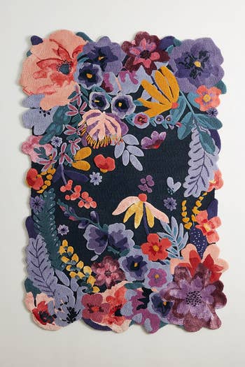 The virbrant multi-colored rug with a floral design