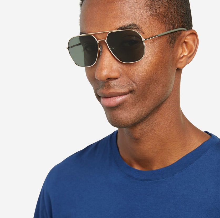 model wearing aviator style sunglasses 