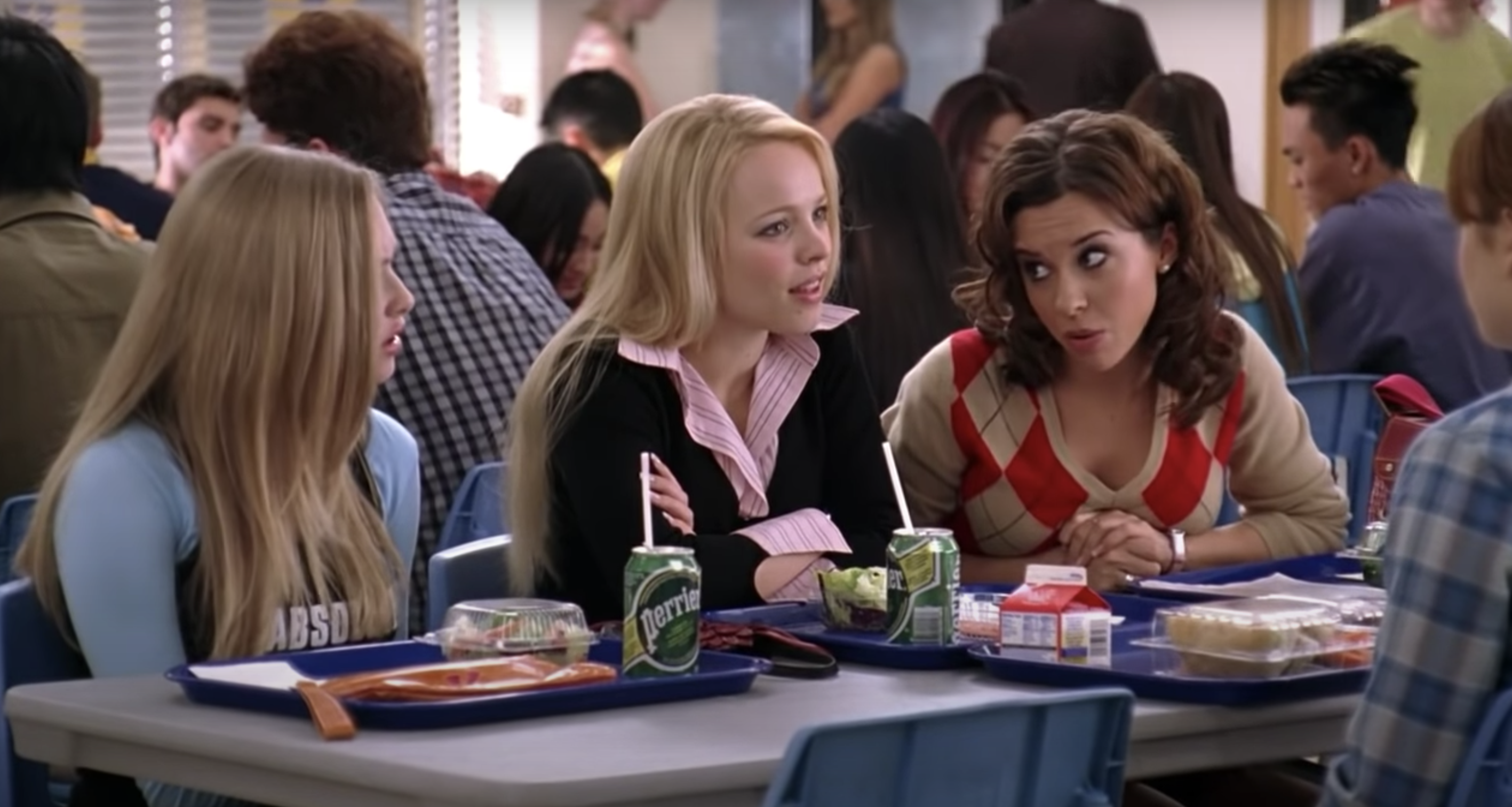 characters from mean girls talking while eating lunch in the cafeteria