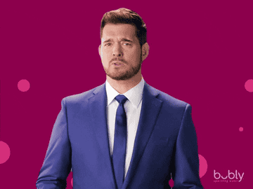 Michael Bublé making a &quot;cut it out&quot; motion with his hand