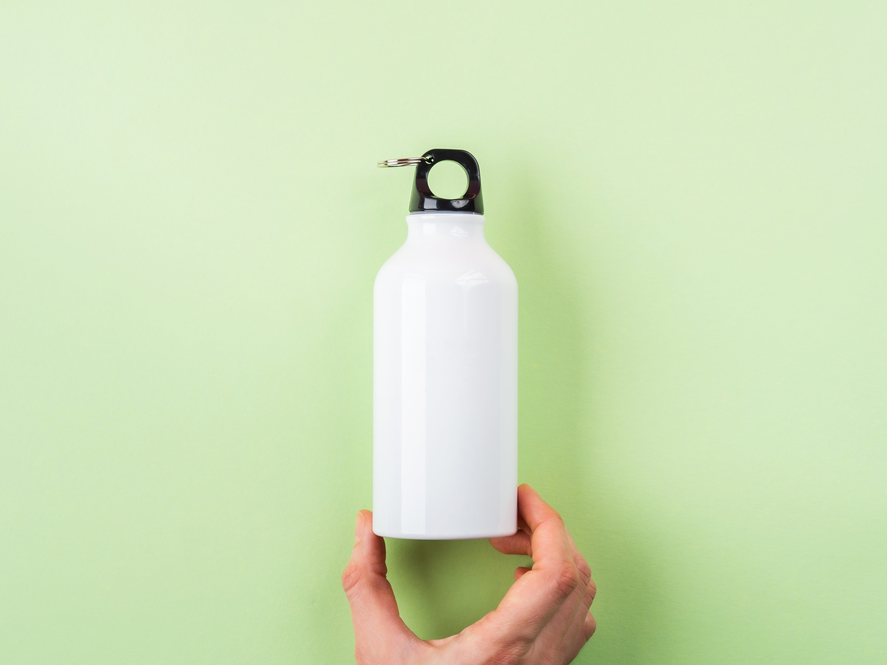 Reuseable Water Bottle on Green Backdrop