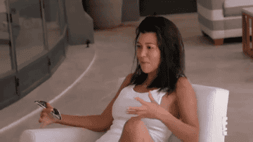 Kourtney explains to her friends how she&#x27;s feeling while sitting outside her house