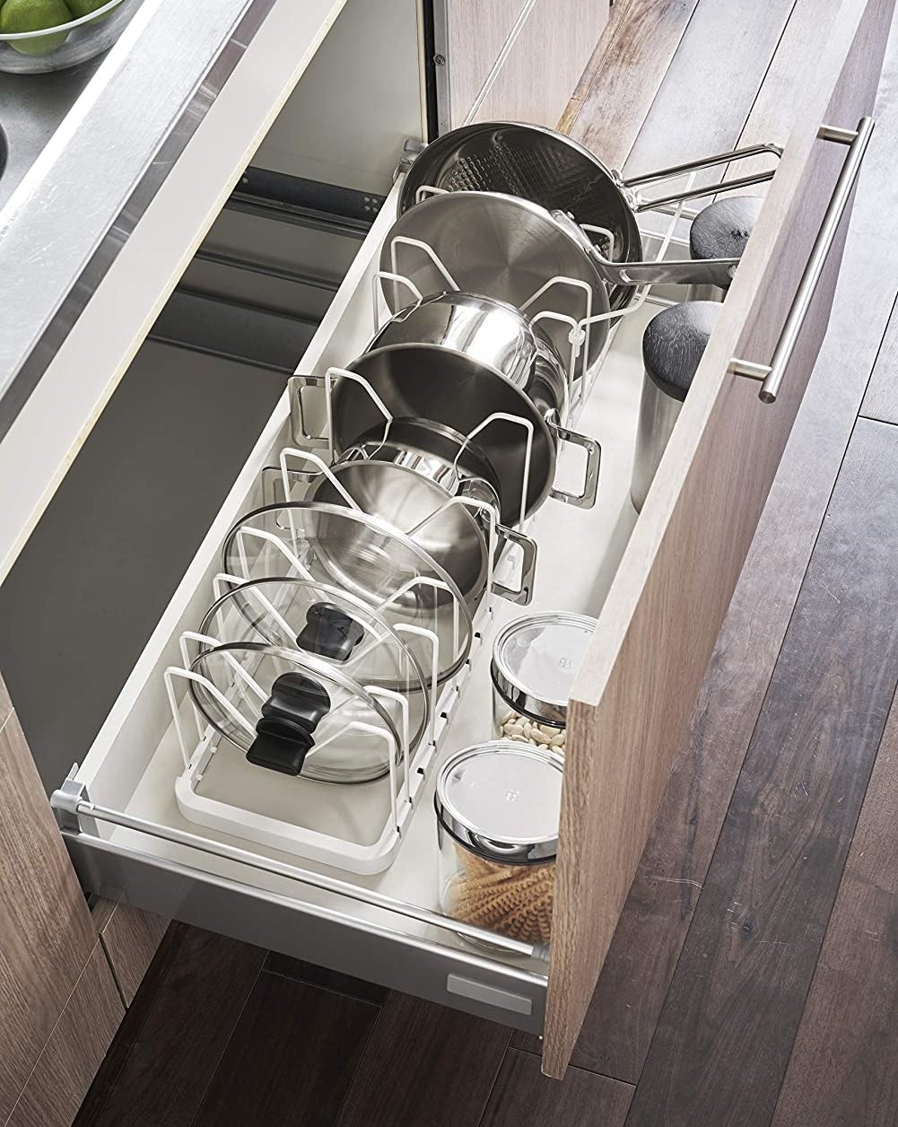 A top down view of the organizer inside a kitchen drawer