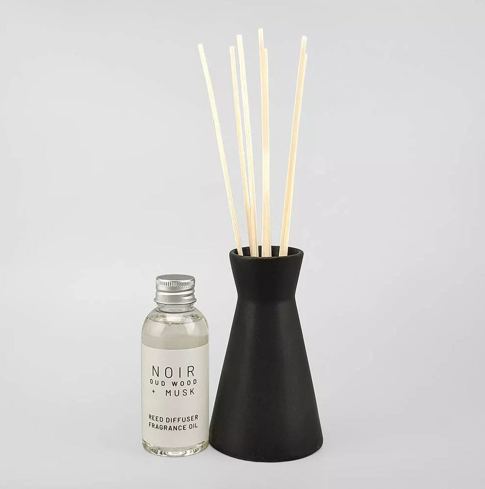 The black reed diffuser with a separate fragrance bottle