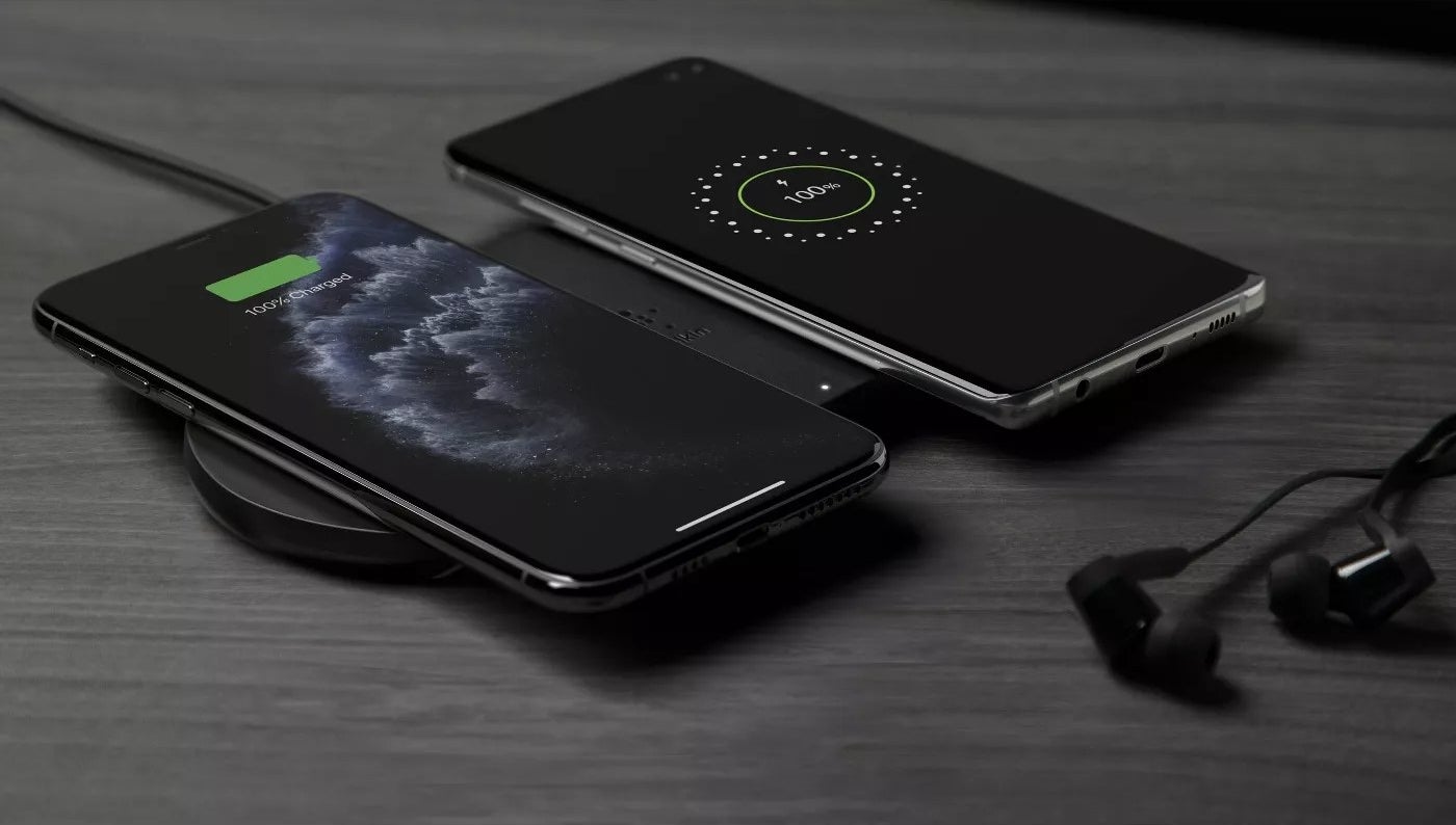 Two phones charging on the charging pad simultaneously 