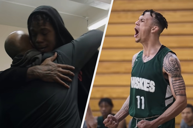 The coach hugging a player and another player celebrating